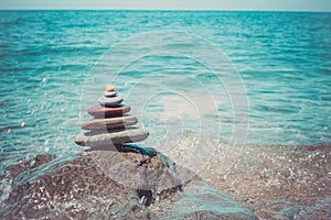 Stack of zen stones near sea. Harmony, balance