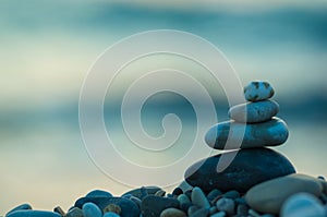 stack of zen stones on pebble beach