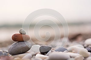 stack of zen stones on pebble beach