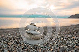 Stack of zen stones on pebble beach