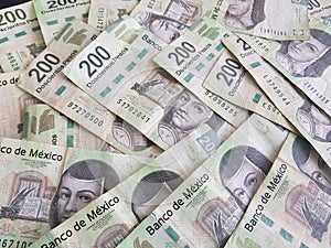 stacked 200 pesos of Mexico bills