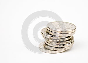 Stacked 5 pence coins