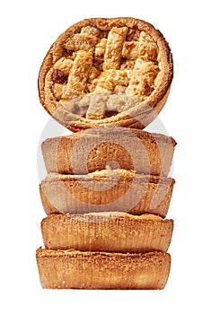 Stacked apple pastries in a studio setting, isolated on white