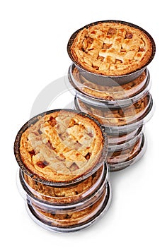 Stacked apple pastries in a studio setting, isolated on white