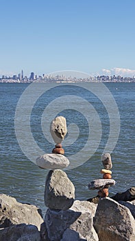 Stacked balanced stones, in an artistic or zen style, in Sausalito, San Francisco, California, USA