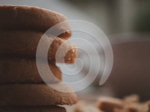 Stacked biscuit sweet cookie on rustic wooden table