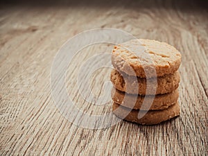 Stacked biscuit sweet cookie on wooden table