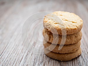 Stacked biscuit sweet cookie on wooden table