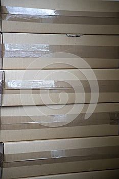 Stacked cardboard boxes awaiting shipment photo