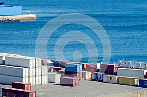 Stacked cargo containers in storage area of freight sea port