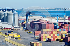 Stacked cargo containers in storage area of freight sea port