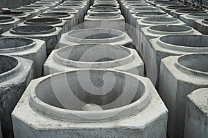 Stacked cement pipes at concrete factory