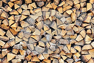 Stacked chopped wood background texture