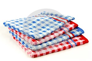 Stacked colorful checkered bathroom wash cloths