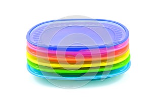 Stacked colorful plastic plates