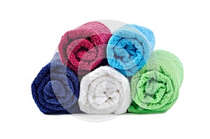 Stacked colorful rolled towels