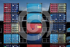 Stacked colorful shipping containers with various markings, under a clear blue sky, creating a vibrant industrial aesthetic, ai