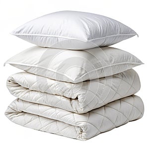 Stacked comforters with white pillows