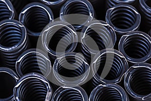 Stacked corrugated PVC plastic pipes