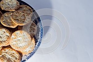 stacked crackers with white background and copy space