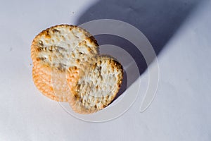 stacked crackers with white background and copy space