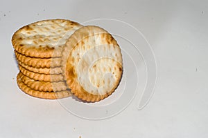 stacked crackers with white background and copy space