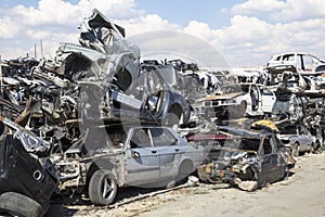 Stacked crushed cars