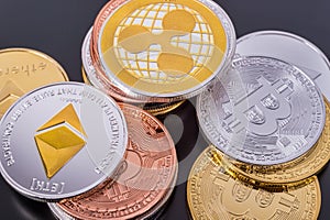 Stacked cryptocurrency coins Bitcoin, Ethereum, Ripple