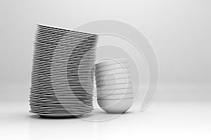 Stacked dishware on white background