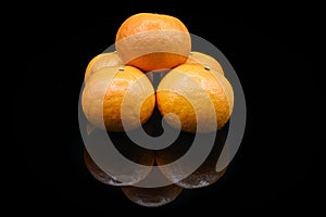 Stacked fresh oranges