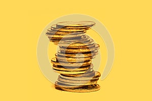 Stacked gold coins, financial concept.