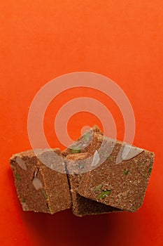 Stacked Indian mithai (dessert) Besan Gajak Barfi.