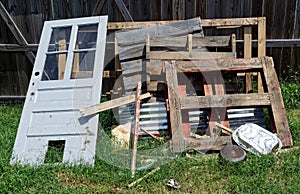 Stacked jumble of scrap wood and junk