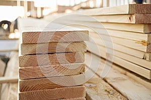 Stacked Lumber at a Building Site photo