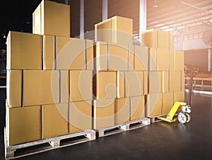 Stacked of Package Boxes on Pallets at Storage Warehouse. Shipment Boxes. Cargo Export- Import. Shipping Warehouse Logistics.