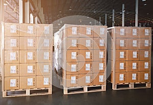 Stacked of Package Boxes Wrapped Plastic Flim on pallet with L-Shape Pallet Corrugated Paper Cardboard Angle Corner Edge Protector