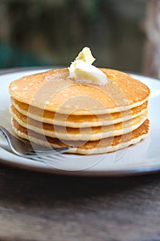 Stacked pancake on wooden table