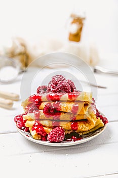 Stacked pancakes with fresh berries