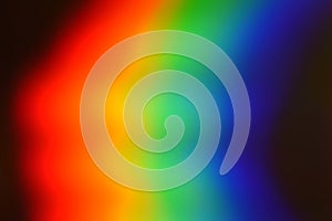 Stacked rainbow waves forming a bold,