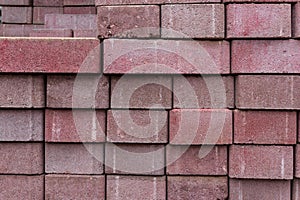 Stacked red bricks / stones