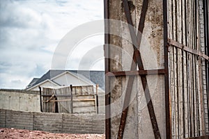 Stacked removable concrete forms for a basement at a residential home construction site