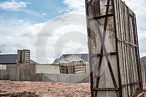 Stacked removable concrete forms for a basement at a residential home construction site