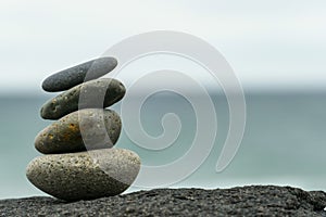 Stacked rocks inuksuk at the beach