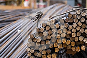 Stacked of rusty metal steel rods on the construction site