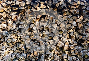 Stacked splitted firewood background