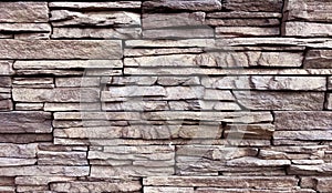 Stacked stone wall background. Photo image