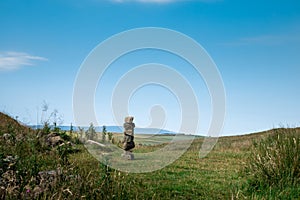 A stacked stone wayfinder in Northumberland countryside