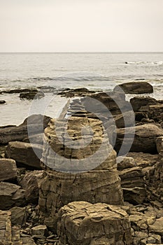 Stacked stones on the beach. Zen concept