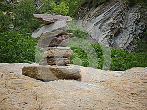Stacked stones marking the way photo