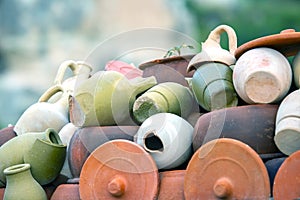 stacked together broken clay pots